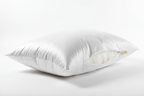 Close-up of plush angel hair fiber queen pillow with silky white cotton cover