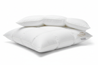 Close-up of plush duck down microfiber queen pillow with white cotton cover